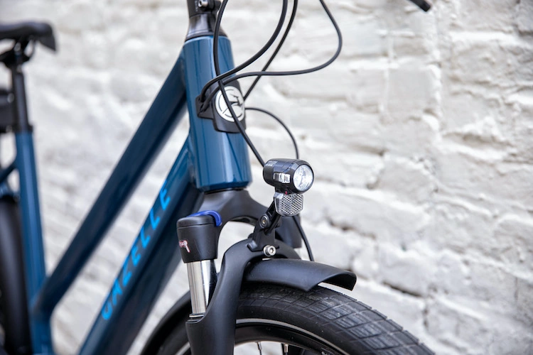 Front section of Electric Bicycle Gazelle and displaying a light