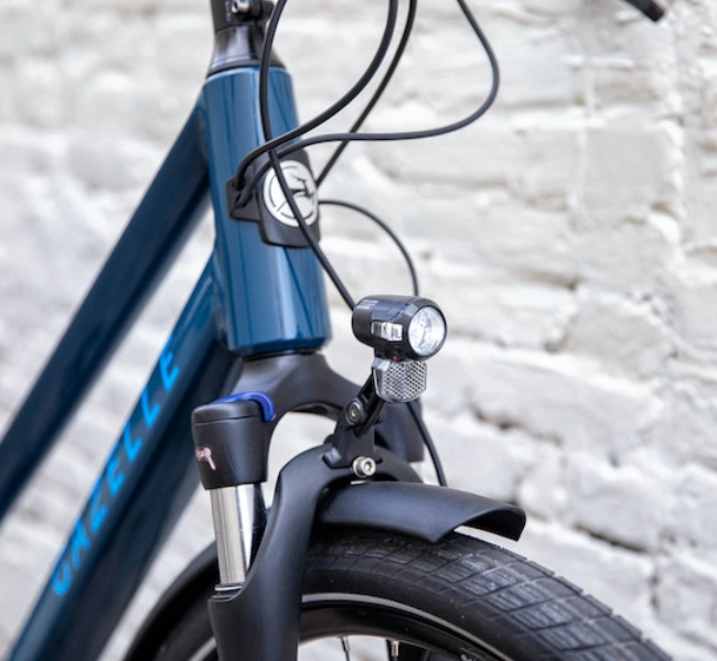 Front section of Electric Bicycle Gazelle and displaying a light